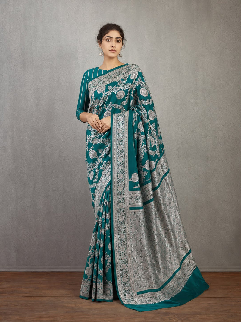 Peacock Teal Banarasi Katan Silk Sari — All-Over Silver Zari Floral Jaal Body & Inverted Silver Pallu