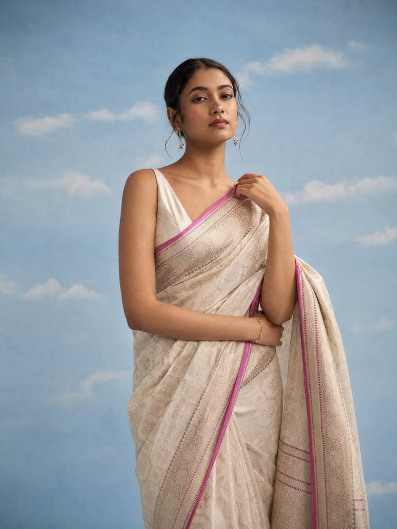 Ivory Silk Banarasi Sari with Tonal Trellis Jaal and Rani Pink Edge
