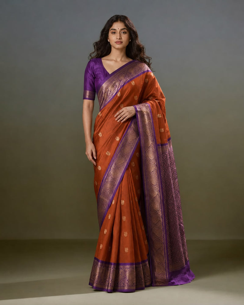 Rust Orange Kanchipuram-Style Silk Sari with Contrast Purple Peacock Border